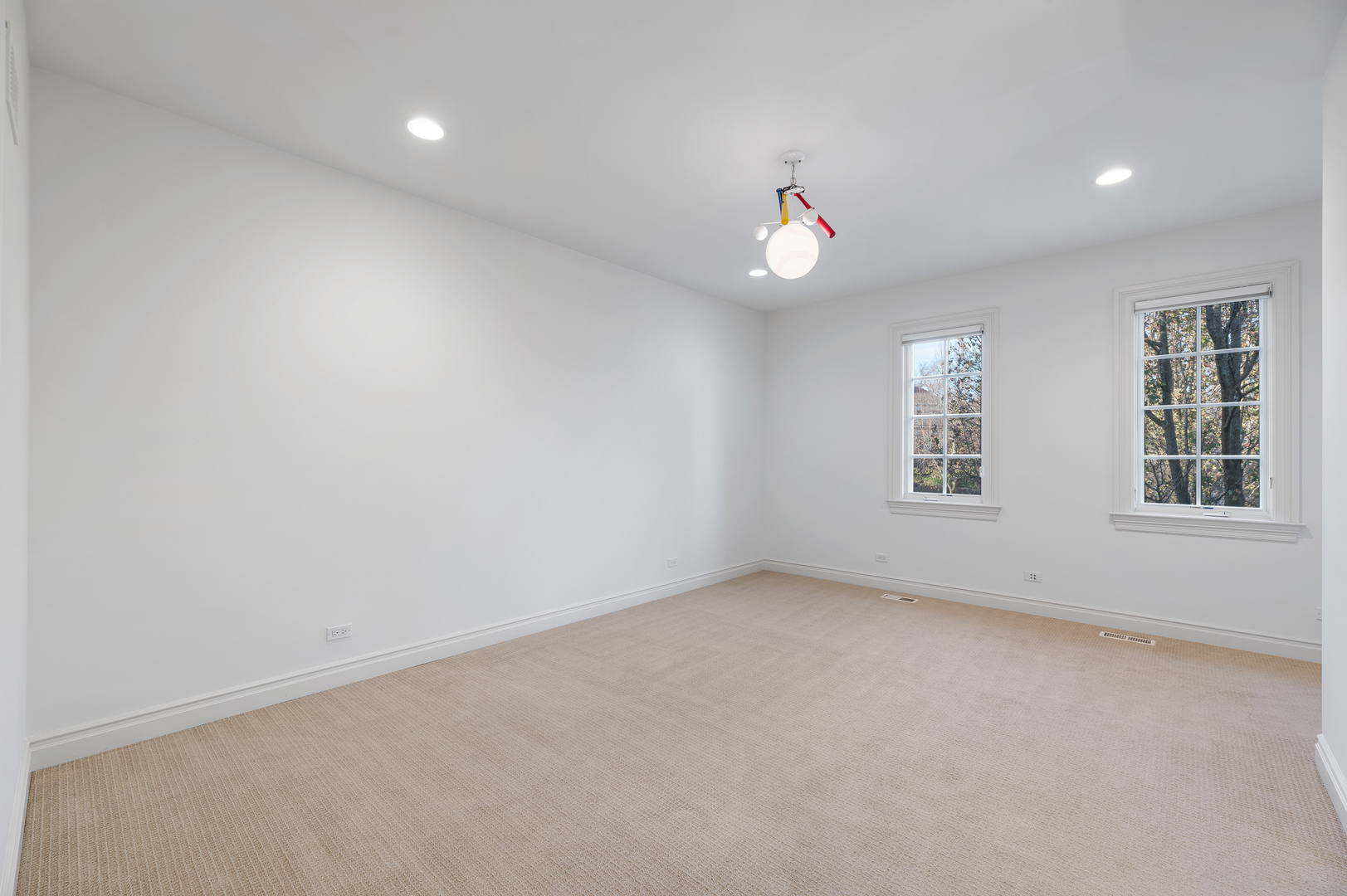 130 Maple Hill Road Glencoe, IL 60022 - Photo 36 of 54 wooden floor in an empty room with a window
