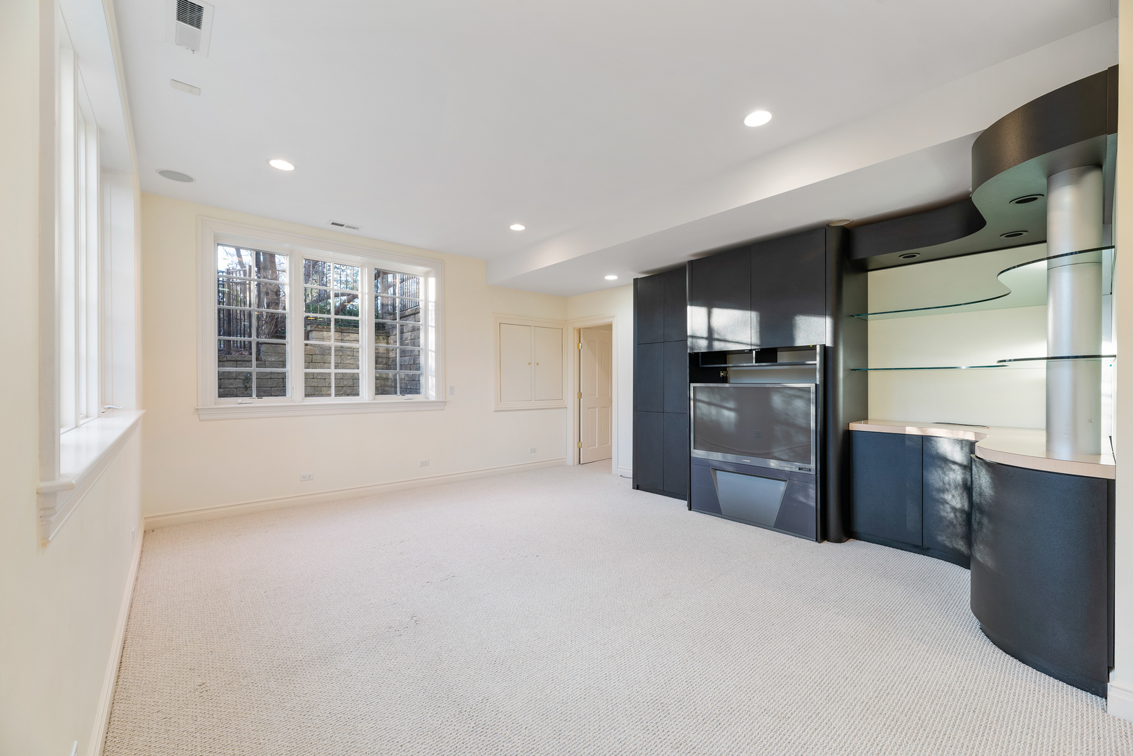 130 Maple Hill Road Glencoe, IL 60022 - Photo 41 of 54 a large kitchen with kitchen island a sink stainless steel appliances and cabinets