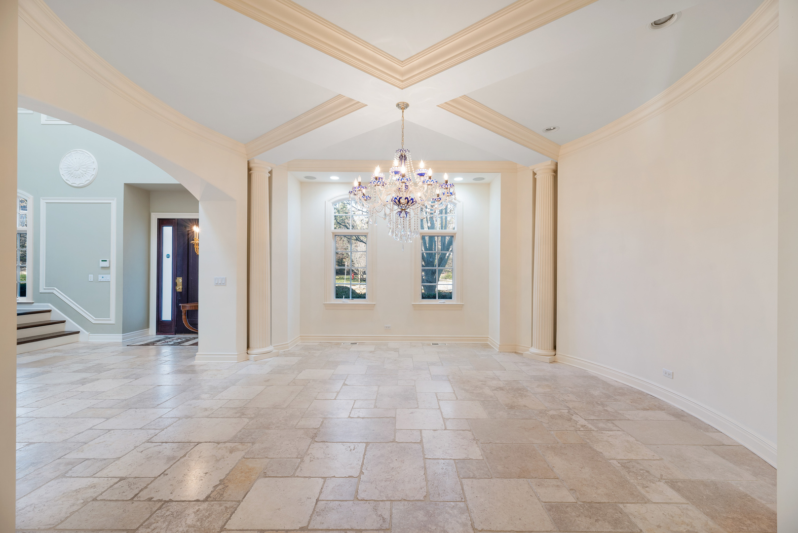 130 Maple Hill Road Glencoe, IL 60022 - Photo 7 of 54 a view of a chandelier in big room and chandelier