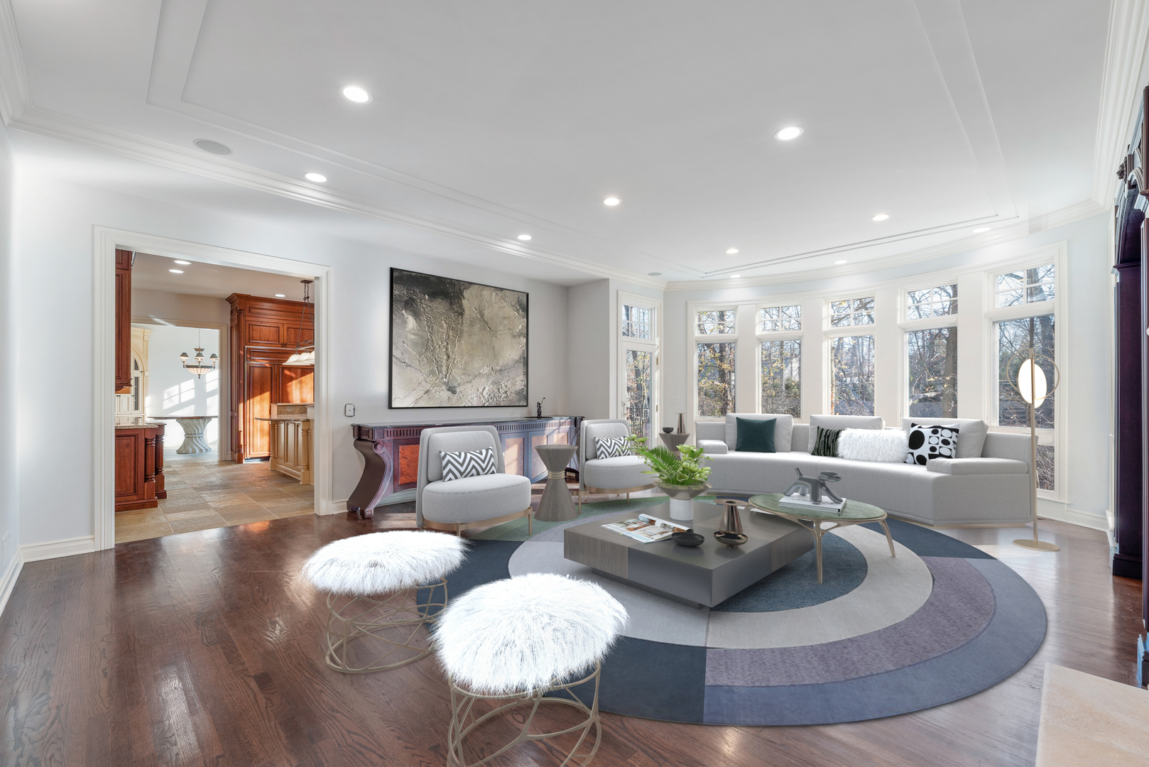 130 Maple Hill Road Glencoe, IL 60022 - Photo 10 of 54 a living room with couches and a large mirror with wooden floor
