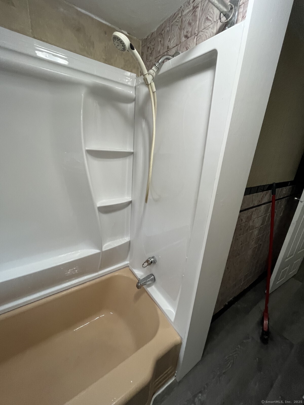 8 Burnham Street, Unit 2A Plymouth, CT 06786 - Photo 5 of 13 a bathroom with a tub and a shower