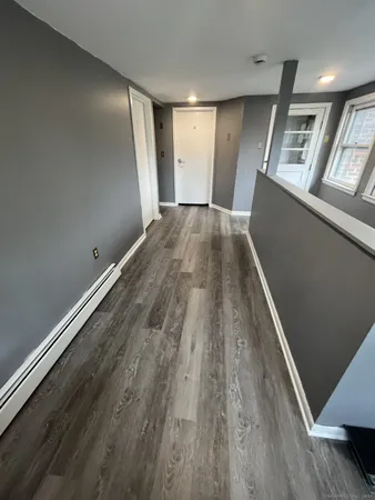 wooden floor in an empty room with wooden floor