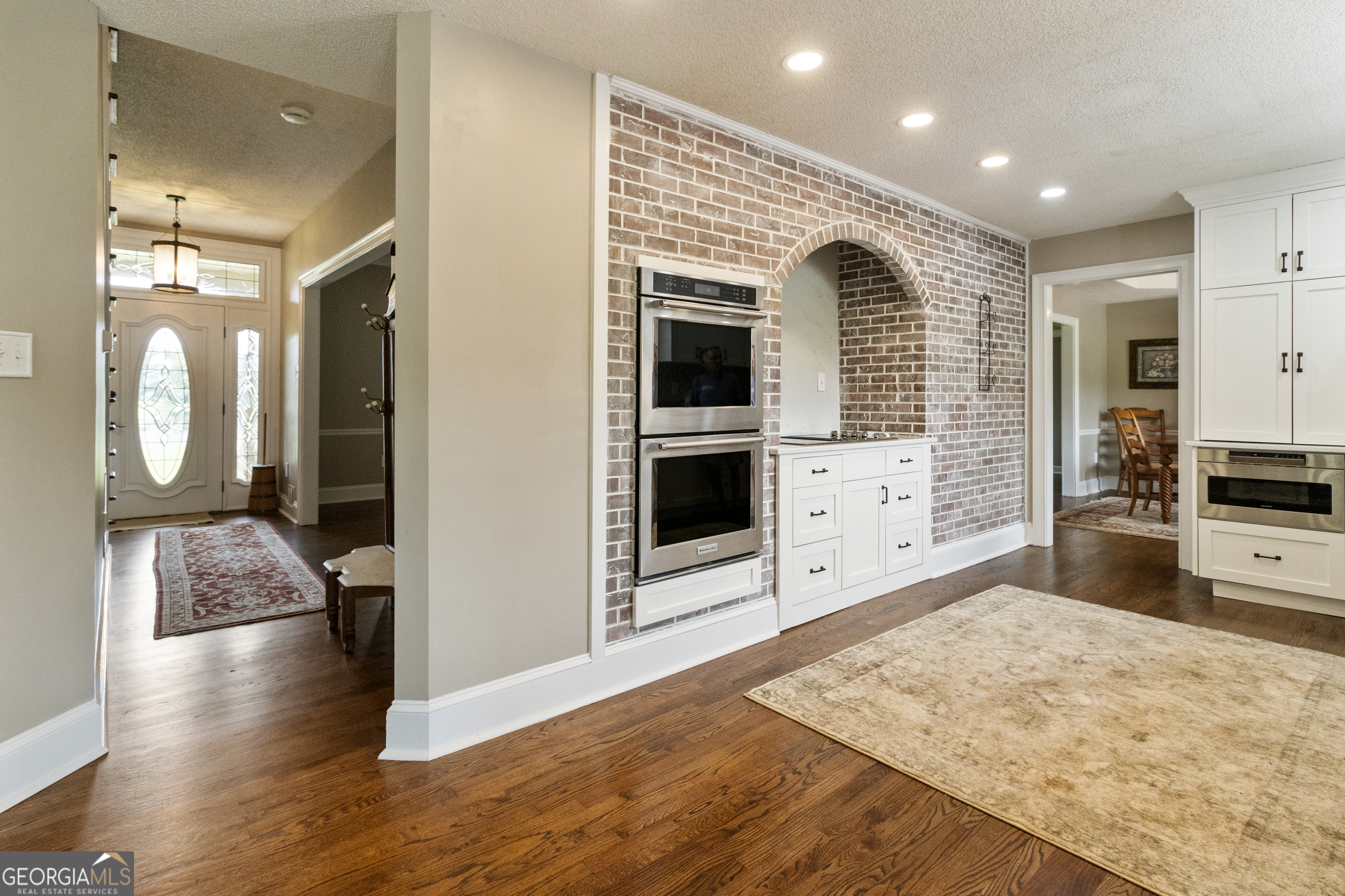 3890 Newnan Road Williamson, GA 30292 - Photo 18 of 57 a view of a kitchen with a sink and a refrigerator