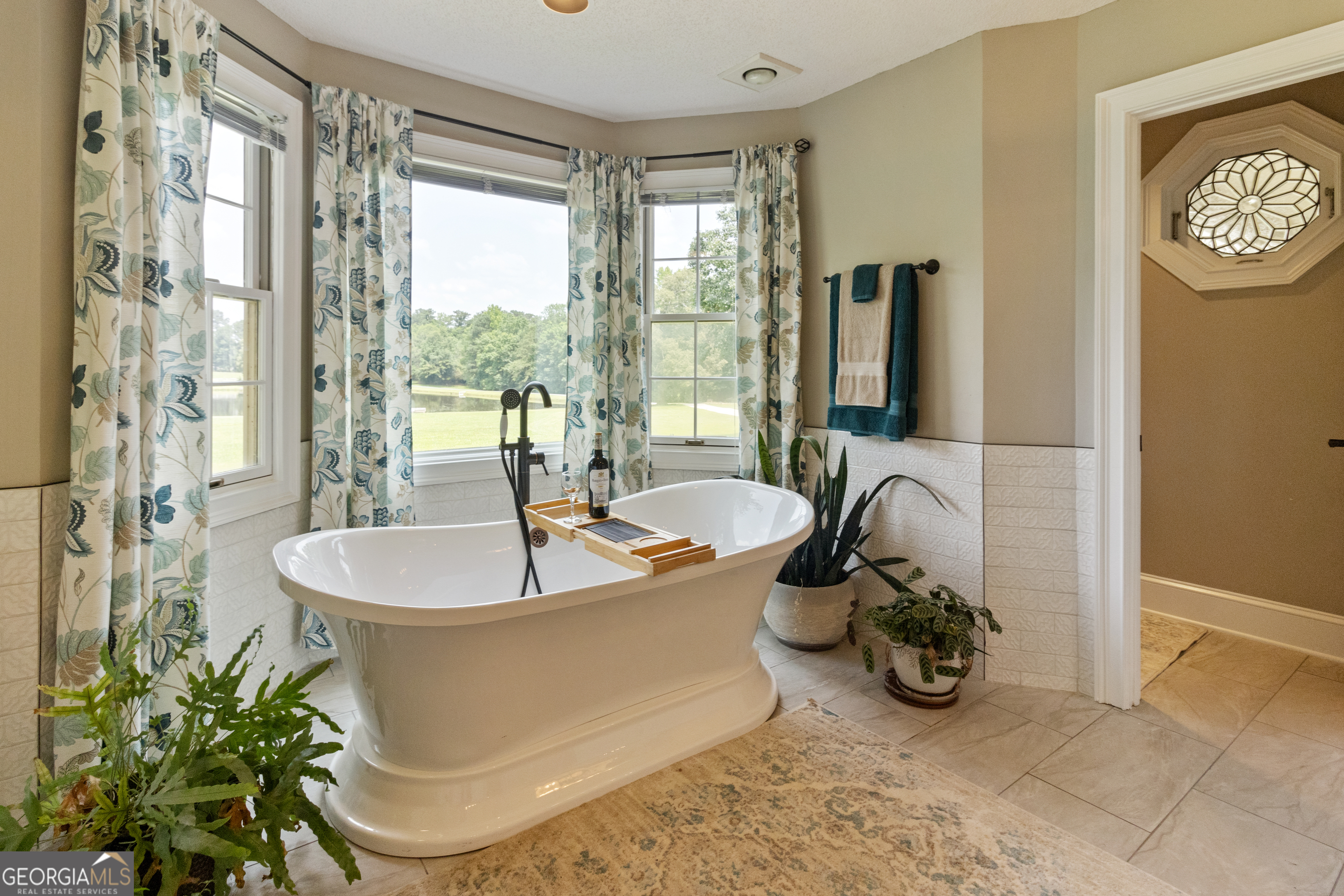 3890 Newnan Road Williamson, GA 30292 - Photo 30 of 57 a living room with large window