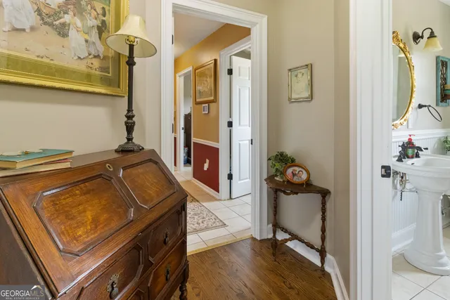 a utility room with sink dryer and washer