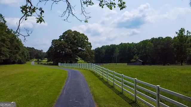 a view of a golf course with a garden