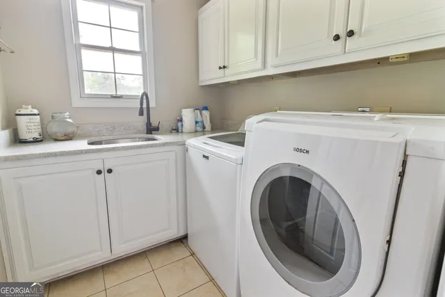 a living room with furniture or couch and a window