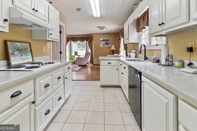 a view of swimming pool with seating space and yard