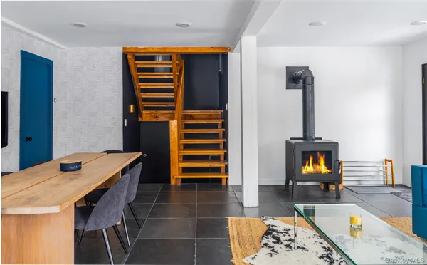 a dining room with a table and chairs