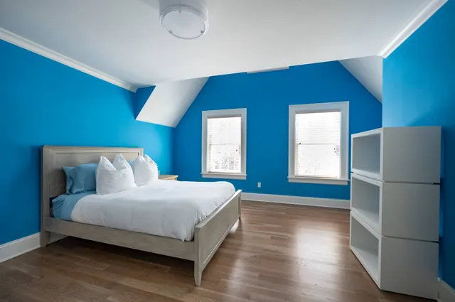 a living room with furniture window and a flat screen tv