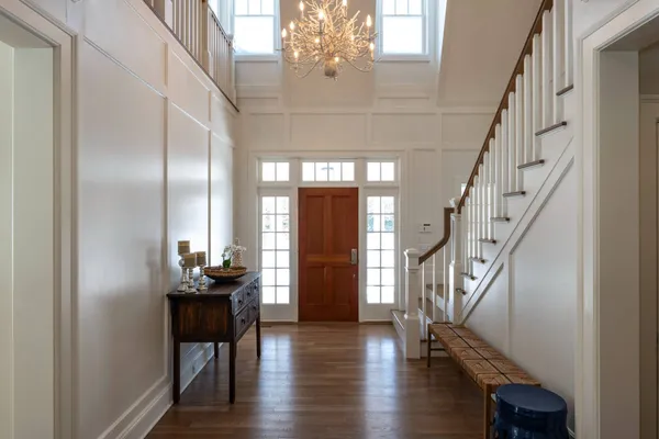 a view of entryway with wooden floor