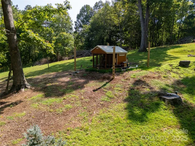 a view of a garden with a bench