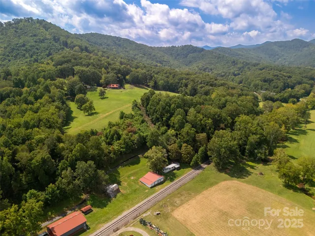 an aerial view of a golf course with a yard