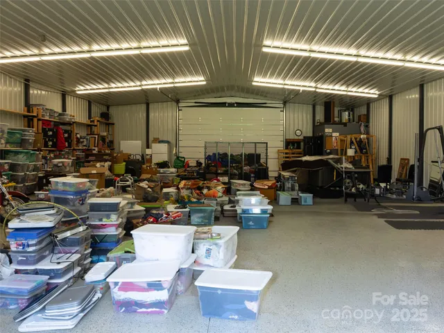 a view of yard with swimming pool and green space