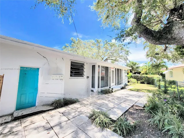 a view of a house with a patio