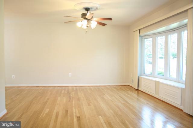 6021 Craft Road Alexandria, VA 22310 - Photo 3 of 30 wooden floor in a room next to a window