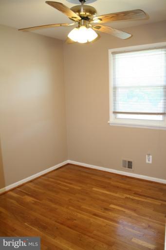 6021 Craft Road Alexandria, VA 22310 - Photo 23 of 30 a view of a room with wooden floor and a window