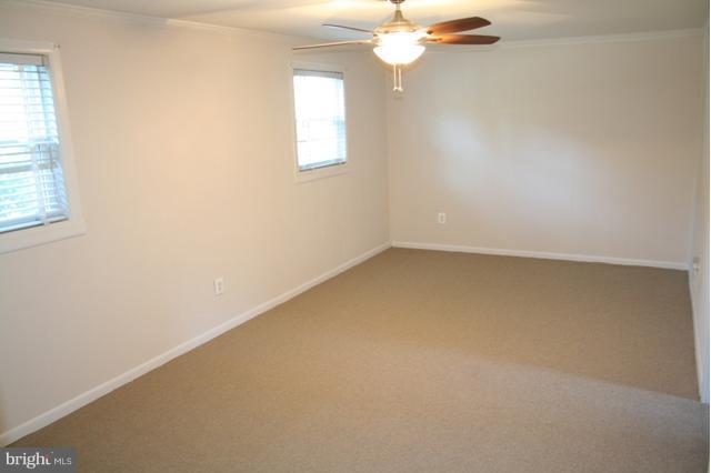 6021 Craft Road Alexandria, VA 22310 - Photo 4 of 30 an empty room with a window