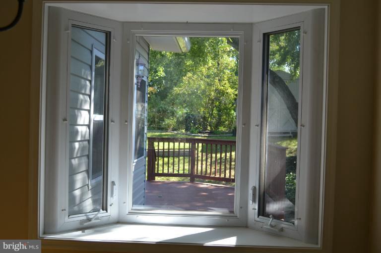 6021 Craft Road Alexandria, VA 22310 - Photo 9 of 30 a view of a glass door with a glass door