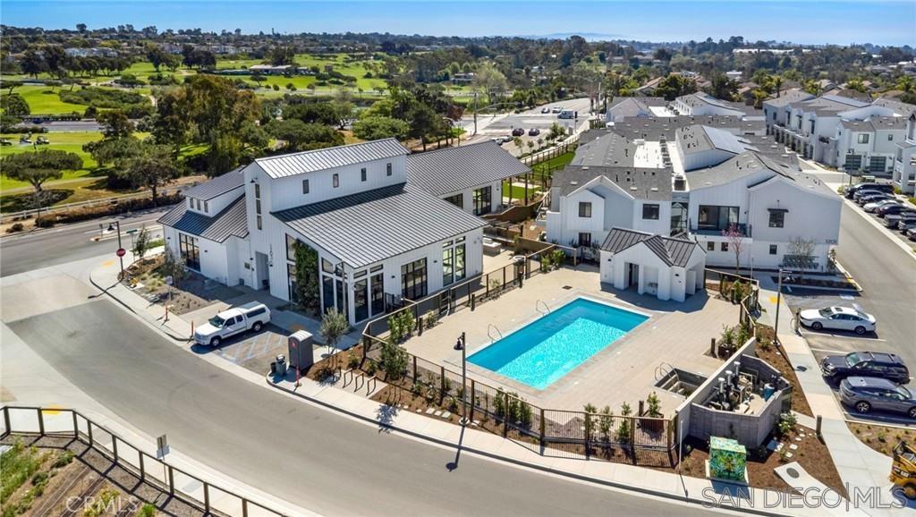 1602 Pl Encinitas Ca, Unit 104 Encinitas, CA 92024 - Photo 18 of 22 an aerial view of a house with a garden