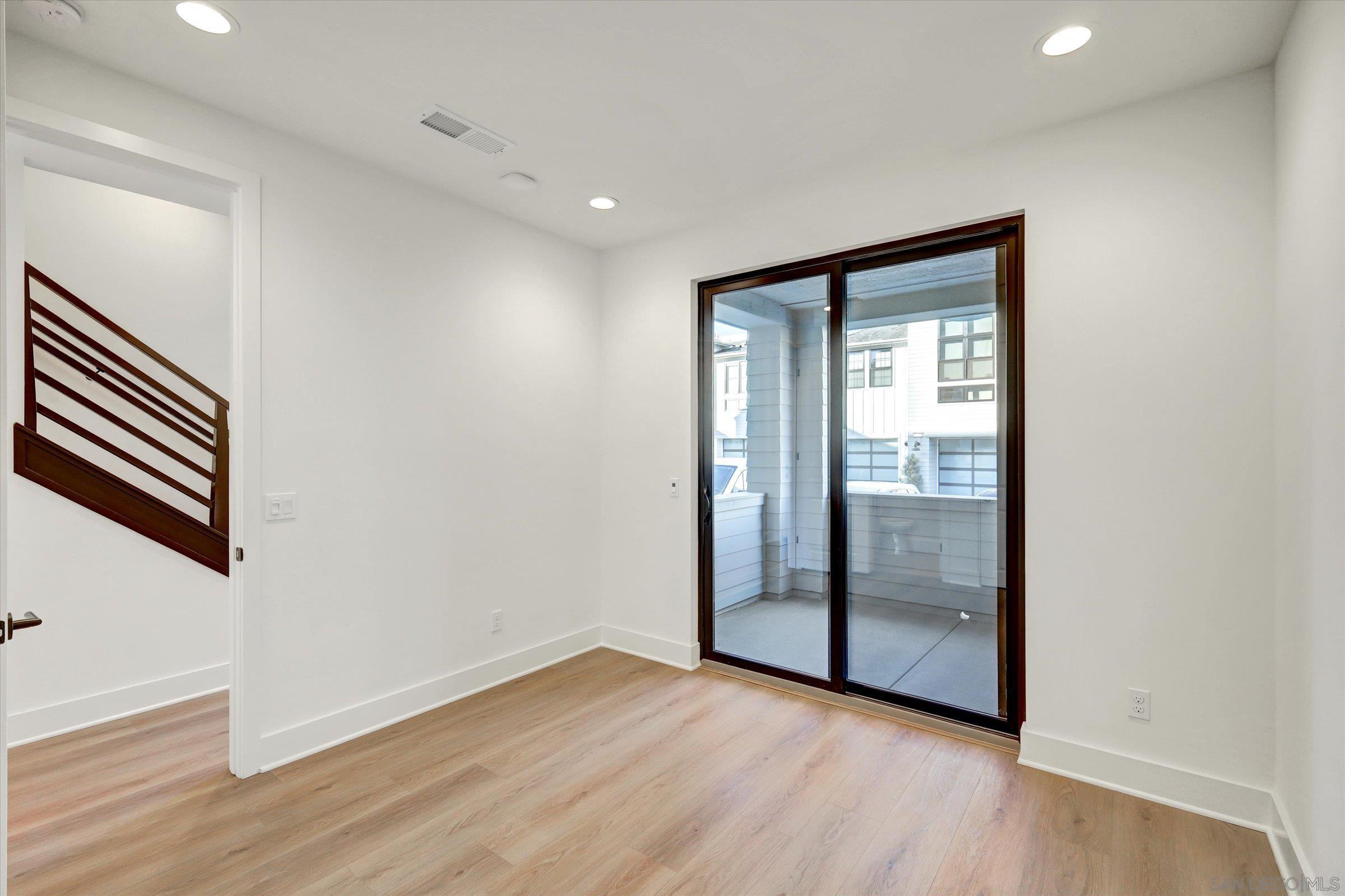 1602 Pl Encinitas Ca, Unit 104 Encinitas, CA 92024 - Photo 10 of 22 wooden floor in an empty room