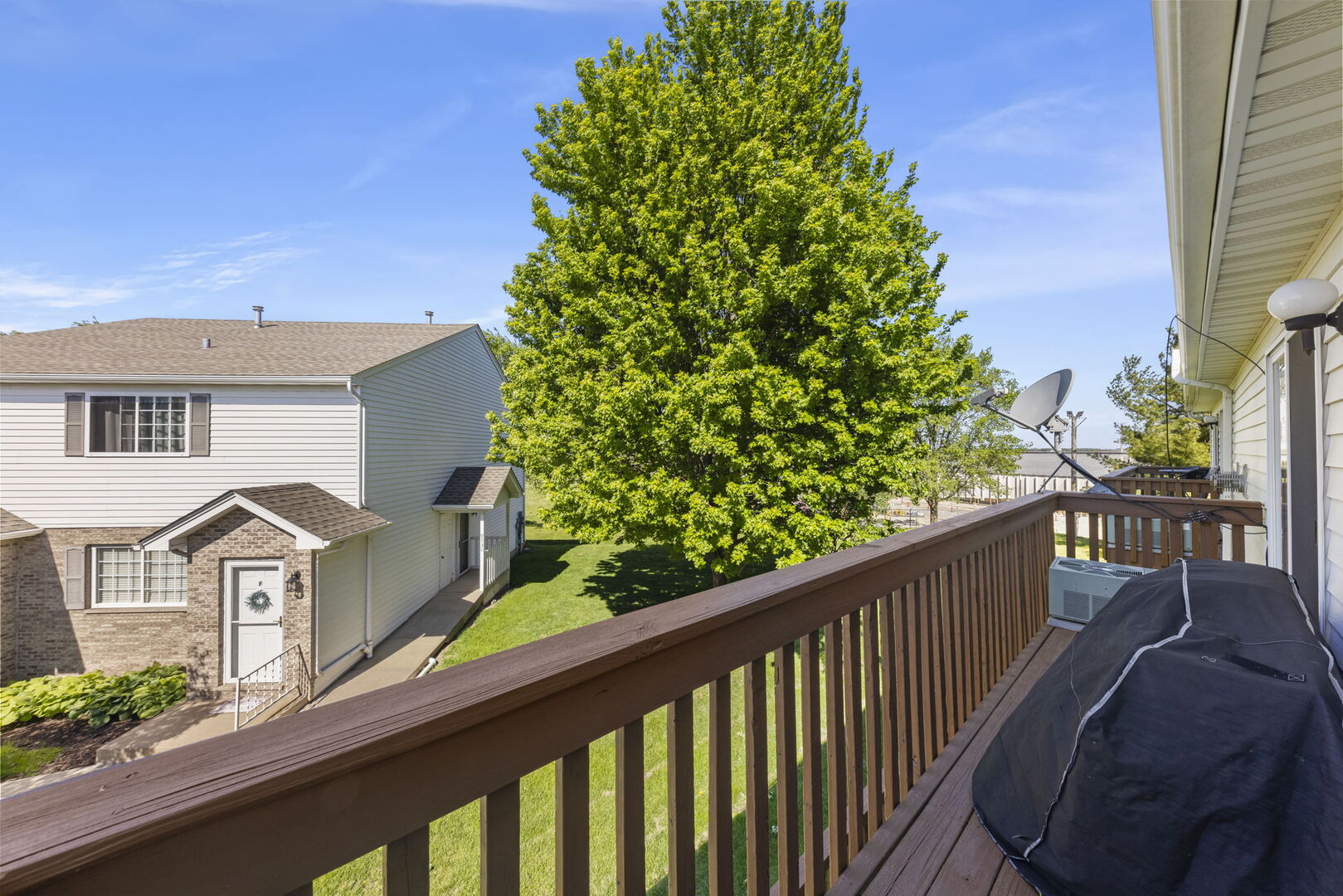 965 Constance Lane, Unit G Sycamore, IL 60178 - Photo 8 of 25 a balcony with an outdoor space
