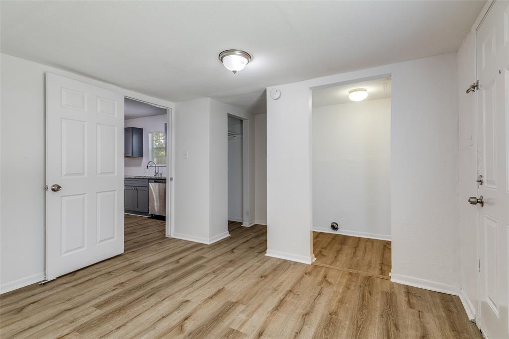 217 Ridgeway Avenue Azle, TX 76020 - Photo 15 of 27 a view of empty room with wooden floor