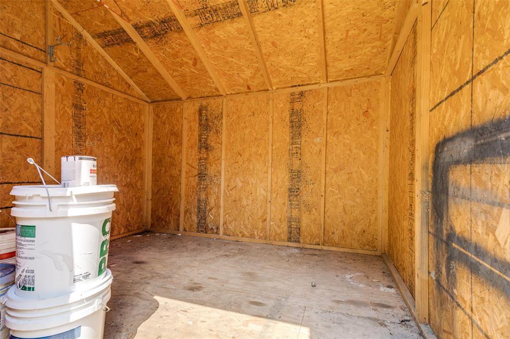 217 Ridgeway Avenue Azle, TX 76020 - Photo 24 of 27 a view of a storage & utility room