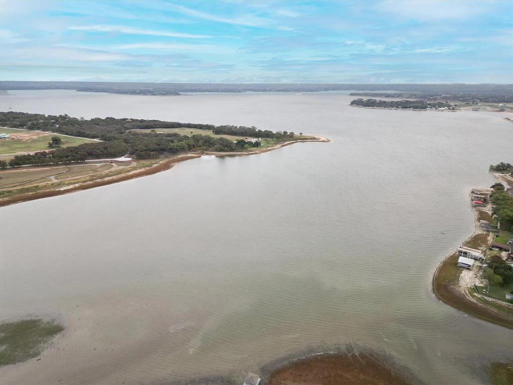 217 Ridgeway Avenue Azle, TX 76020 - Photo 26 of 27 a view of an ocean and beach
