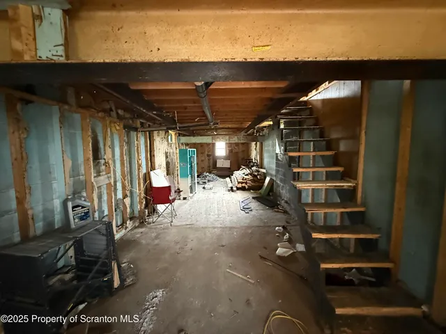 a view of empty room with windows