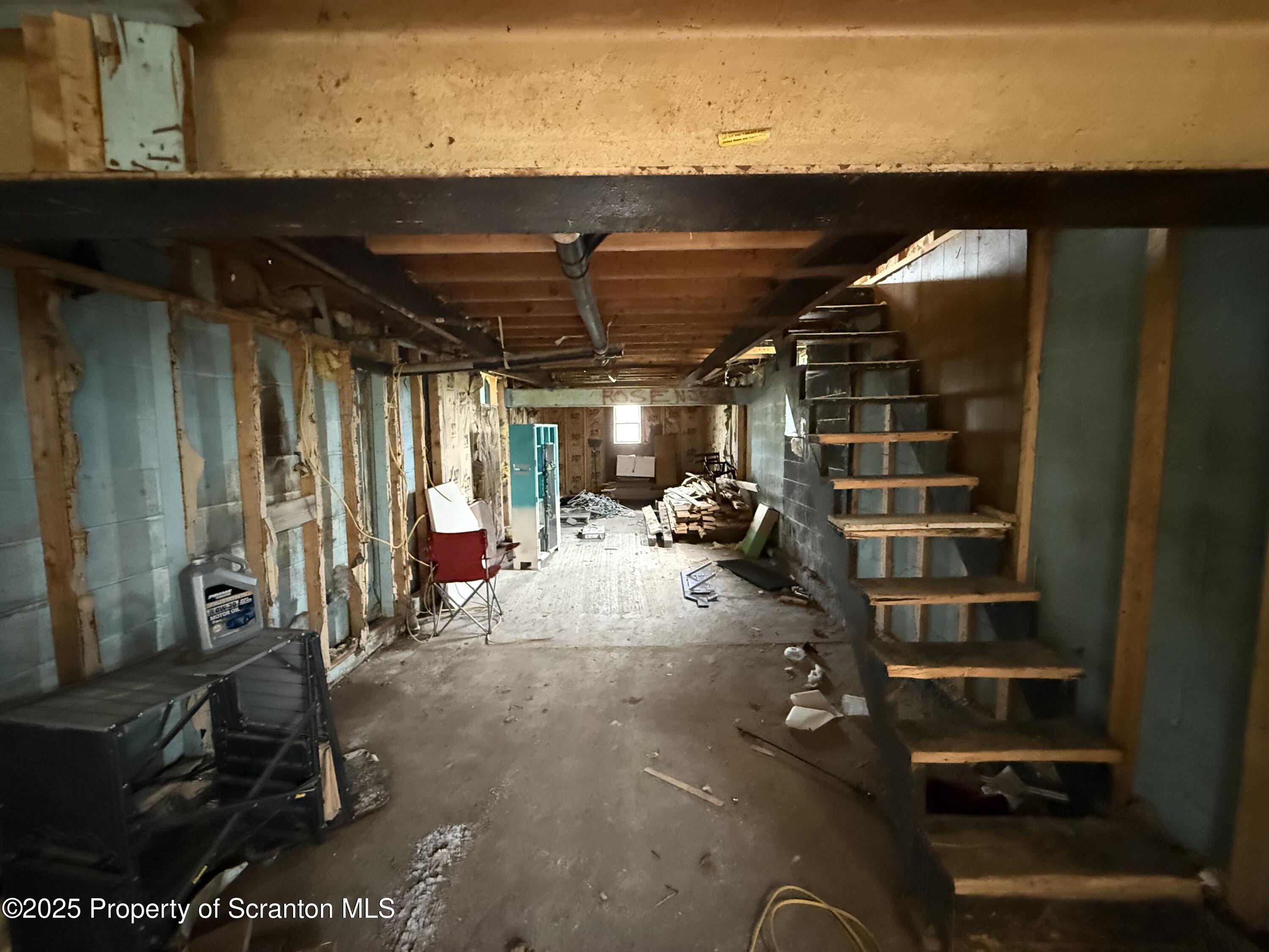 1002 Ridge Street, Unit L 38 Olyphant, PA 18447 - Photo 11 of 15 a view of empty room with windows