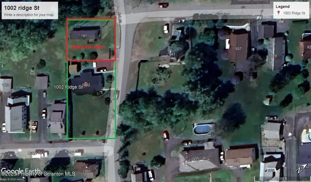 an aerial view of houses and roads