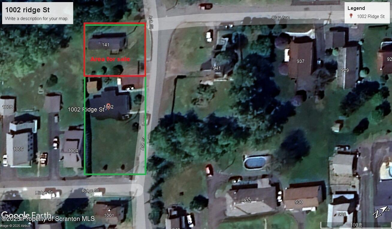 1002 Ridge Street, Unit L 38 Olyphant, PA 18447 - Photo 15 of 15 an aerial view of houses and roads