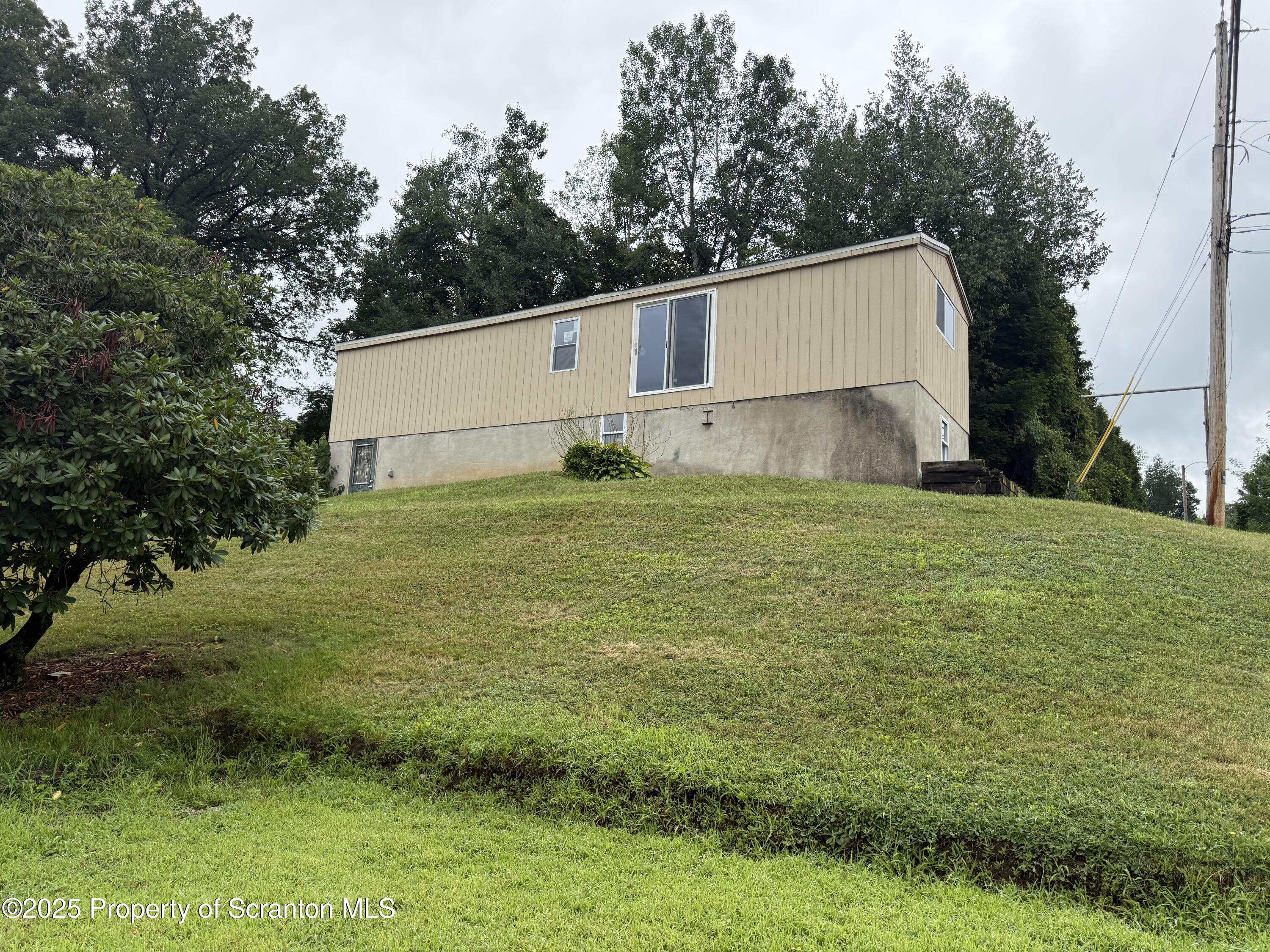 1002 Ridge Street, Unit L 38 Olyphant, PA 18447 - Photo 2 of 15 a view of a backyard