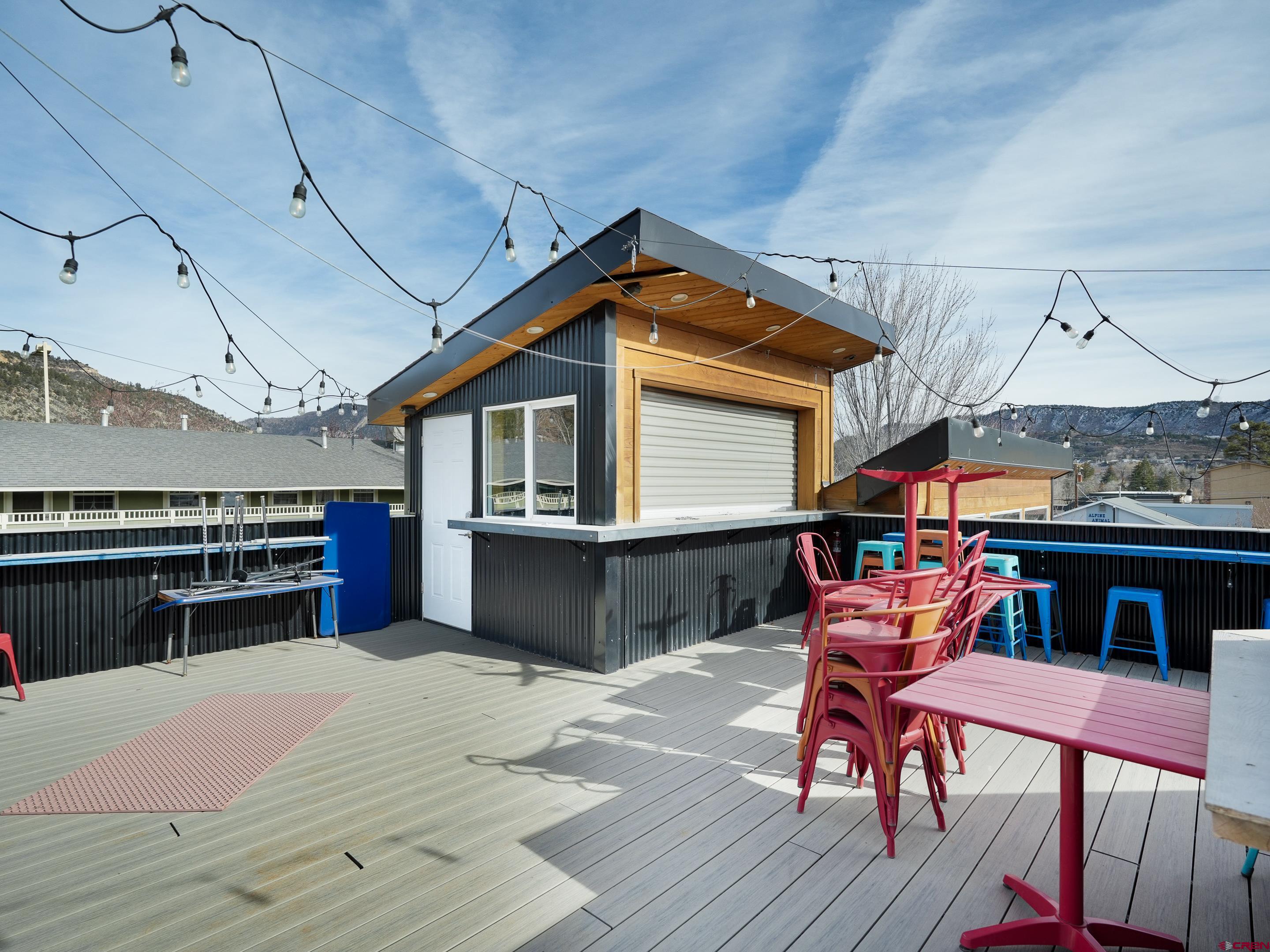 2915 Main Avenue Durango, CO 81301 - Photo 12 of 14 a view of a chairs and table on the deck