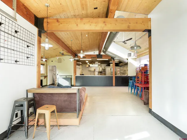 a view of a chairs and table in a room