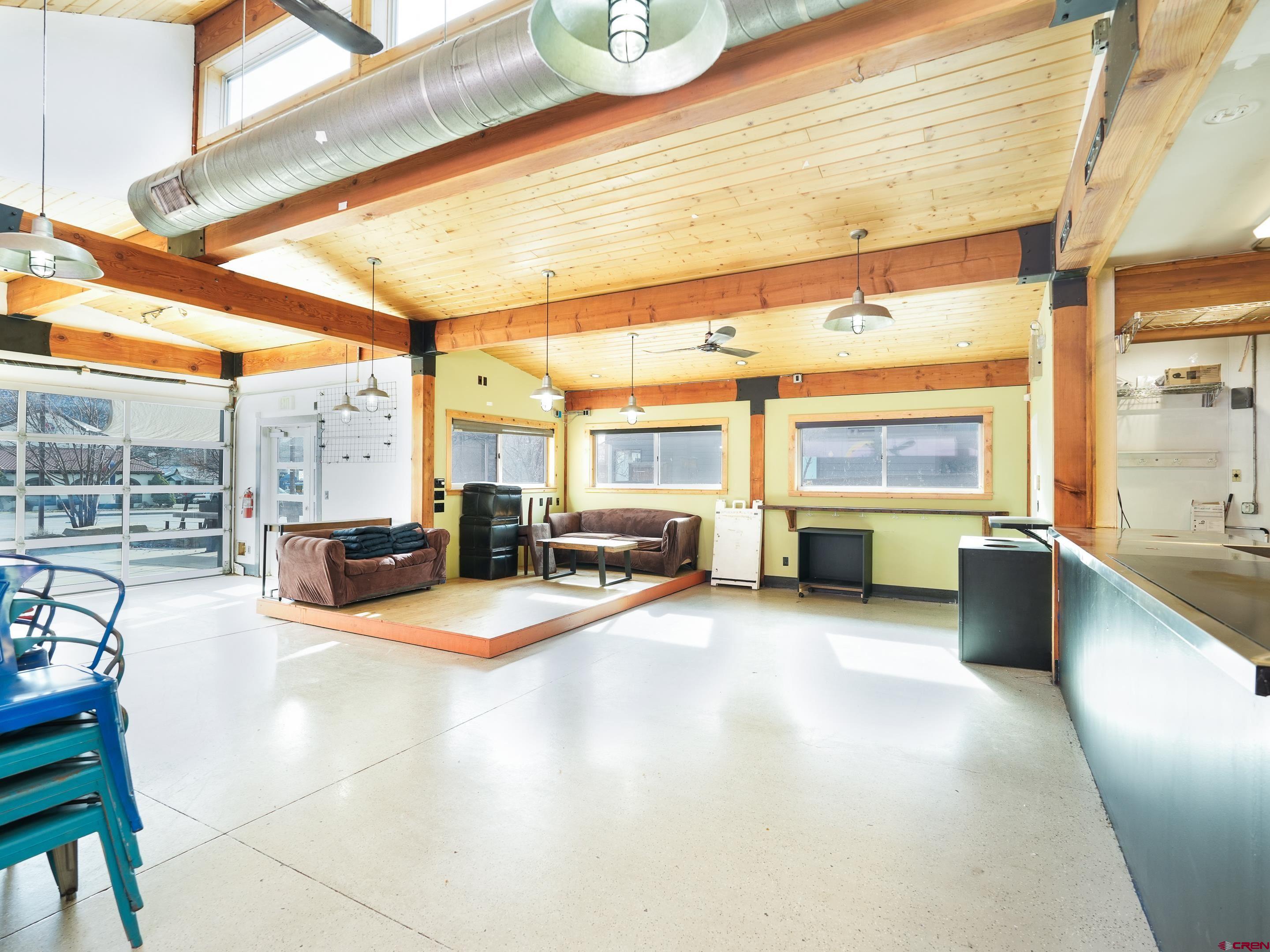 2915 Main Avenue Durango, CO 81301 - Photo 6 of 14 a view of a living room with furniture and kitchen view