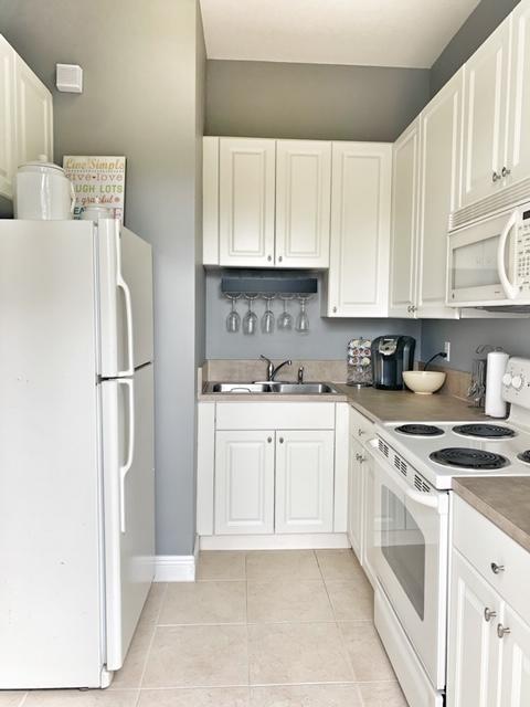 116 Spikerush Road, Unit 1 Jupiter, FL 33458 - Photo 3 of 8 IMG_9802