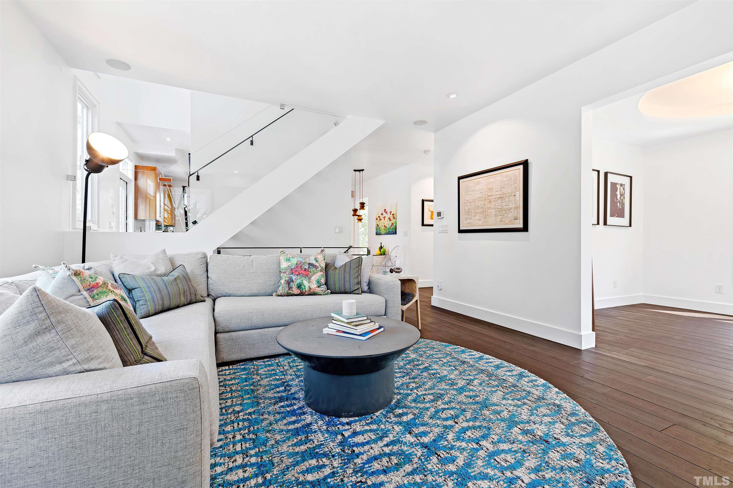 2105 Pine Drive Raleigh, NC 27608 - Photo 15 of 54 a living room with furniture and wooden floor