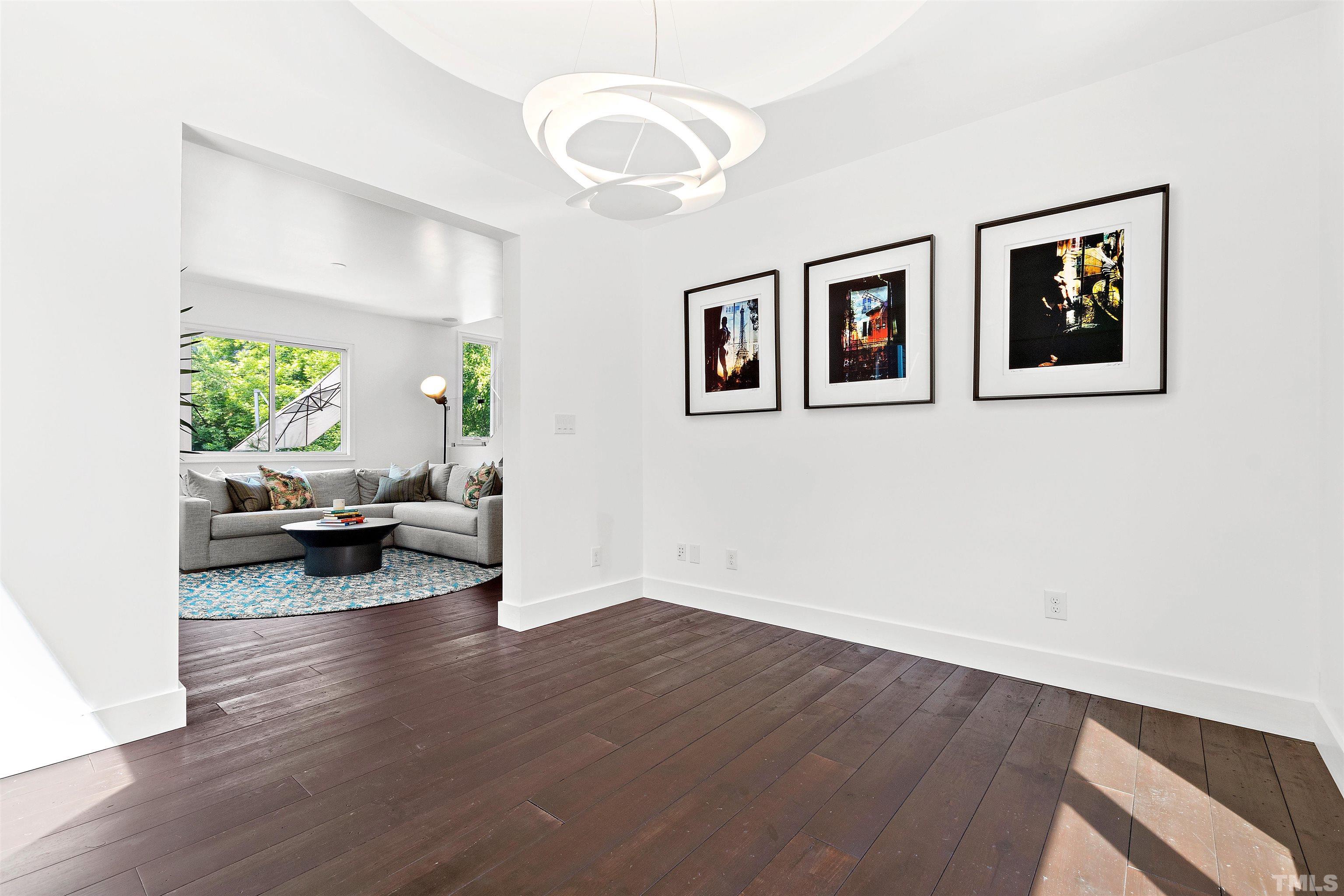 2105 Pine Drive Raleigh, NC 27608 - Photo 18 of 54 a living room with furniture and a wooden floor