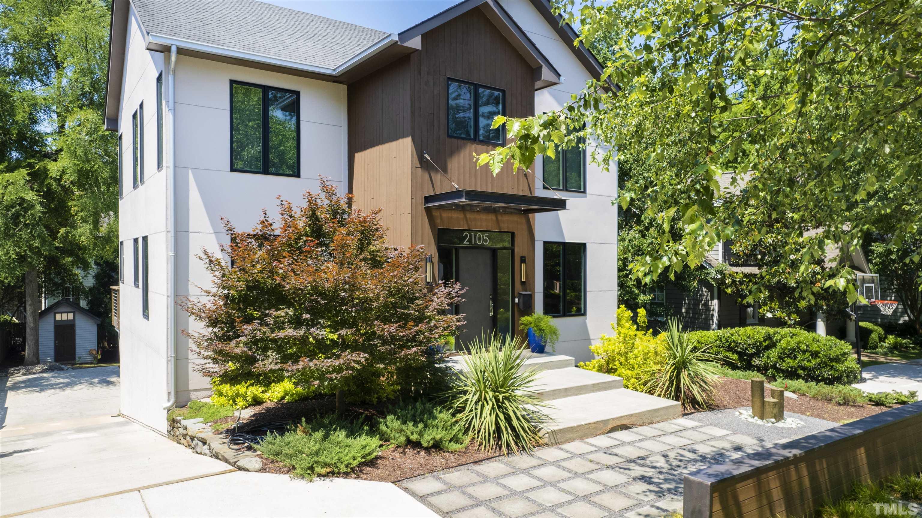 2105 Pine Drive Raleigh, NC 27608 - Photo 2 of 54 a front view of a house with garden