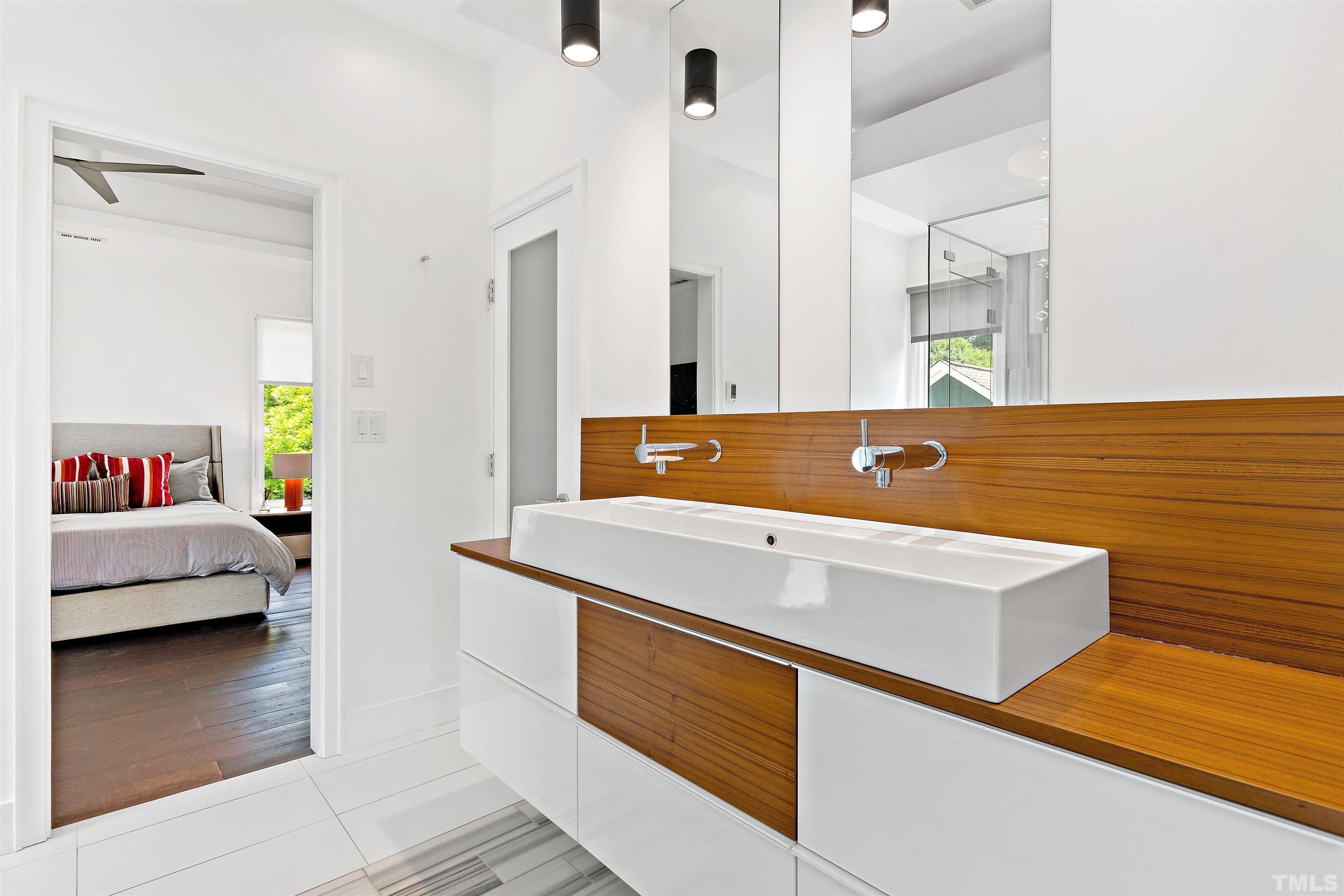 2105 Pine Drive Raleigh, NC 27608 - Photo 24 of 54 a view of bathroom with dual sinks