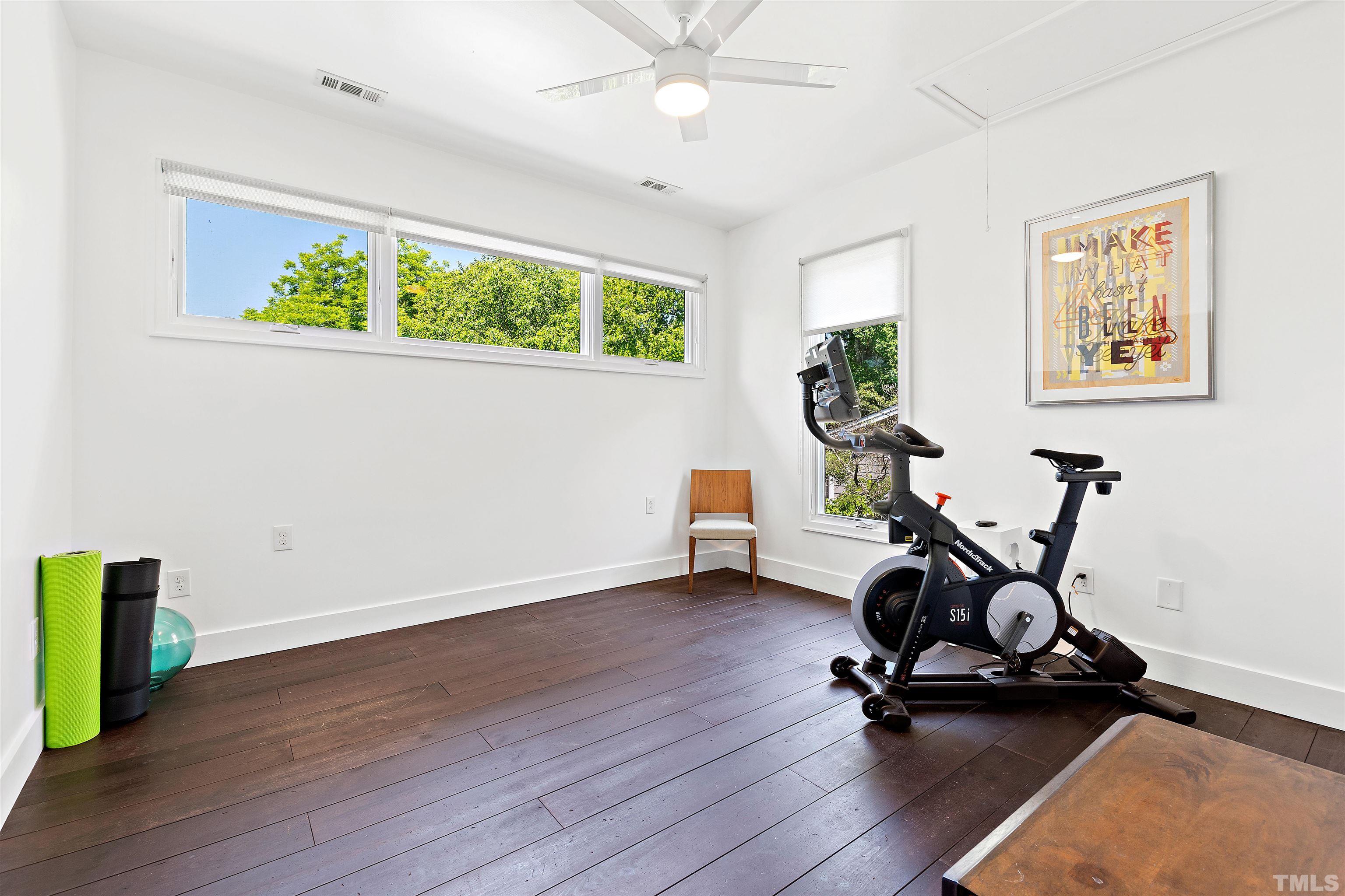 2105 Pine Drive Raleigh, NC 27608 - Photo 29 of 54 a view of a workspace with furniture and a window