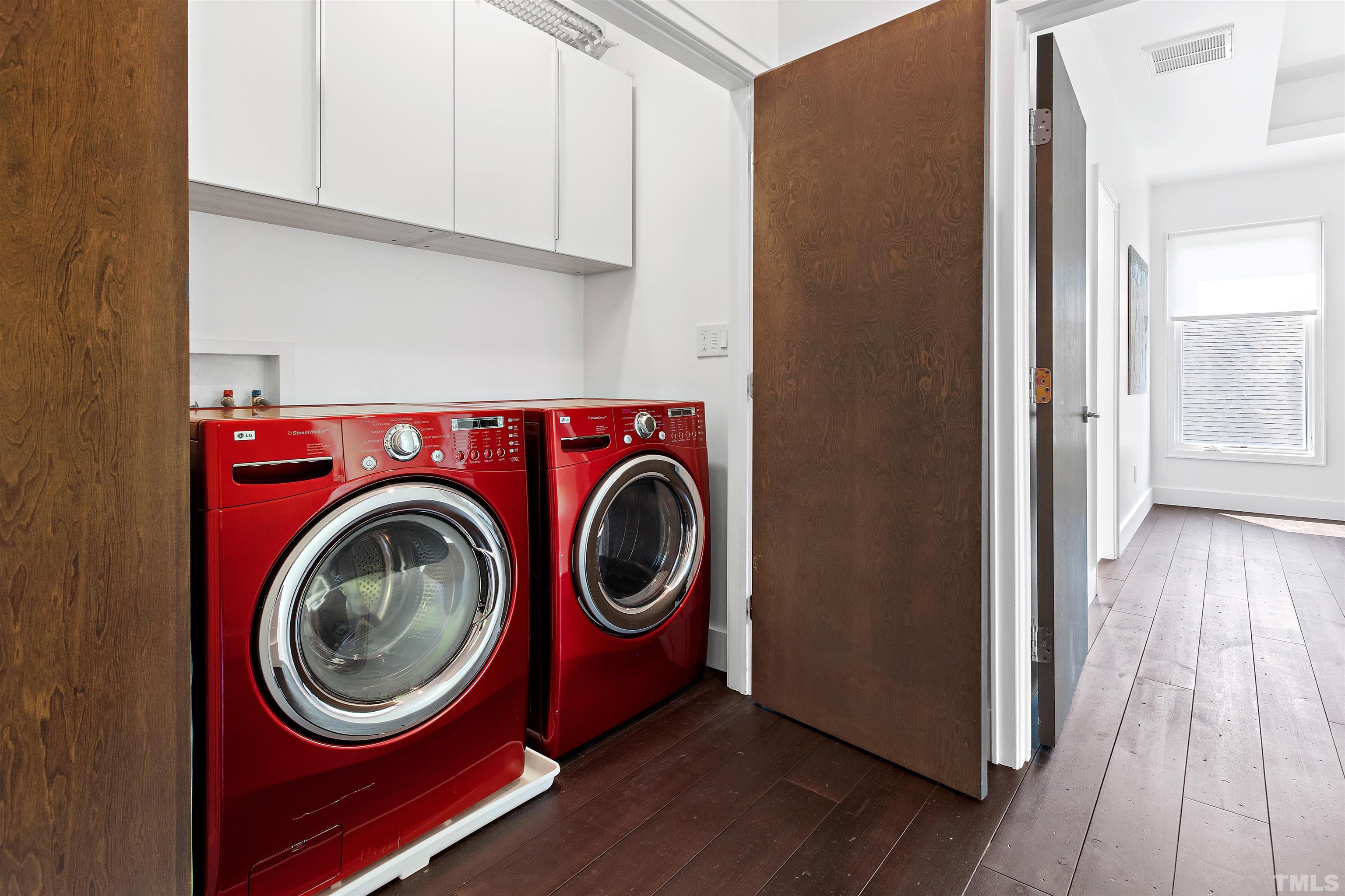 2105 Pine Drive Raleigh, NC 27608 - Photo 30 of 54 a storage room with washer and dryer