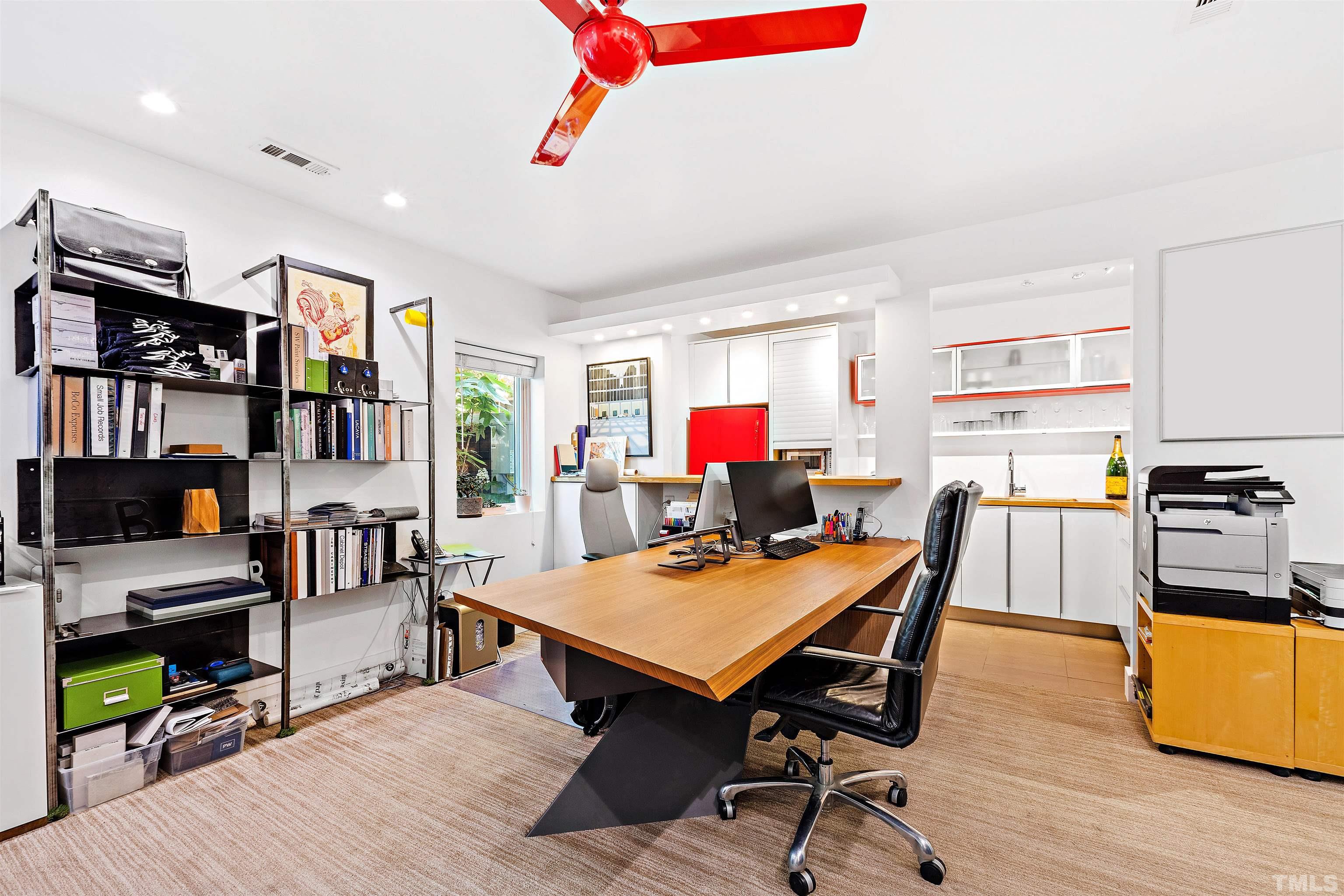 2105 Pine Drive Raleigh, NC 27608 - Photo 32 of 54 a workspace with furniture and wooden floor