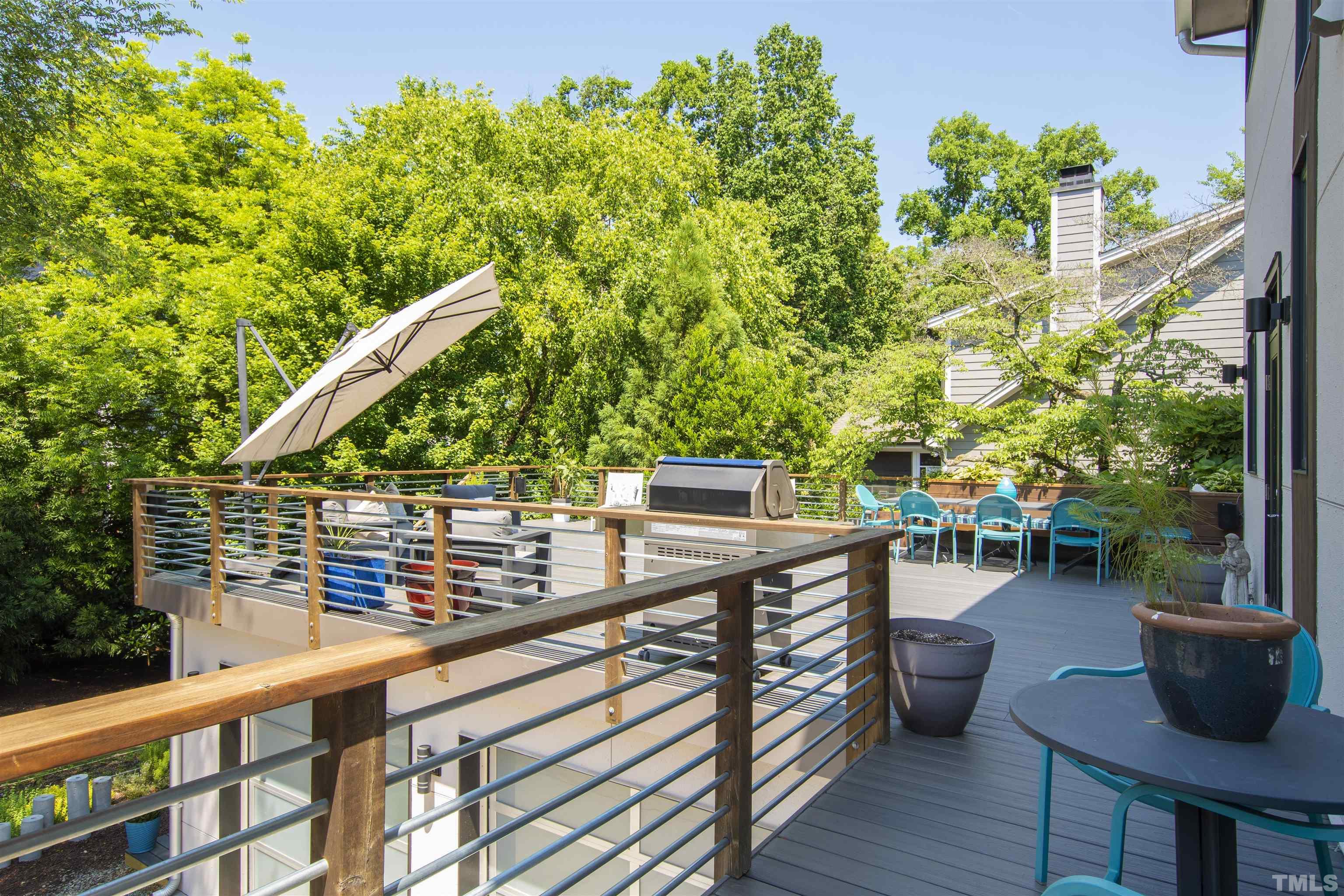 2105 Pine Drive Raleigh, NC 27608 - Photo 43 of 54 a view of a chairs and table in the balcony