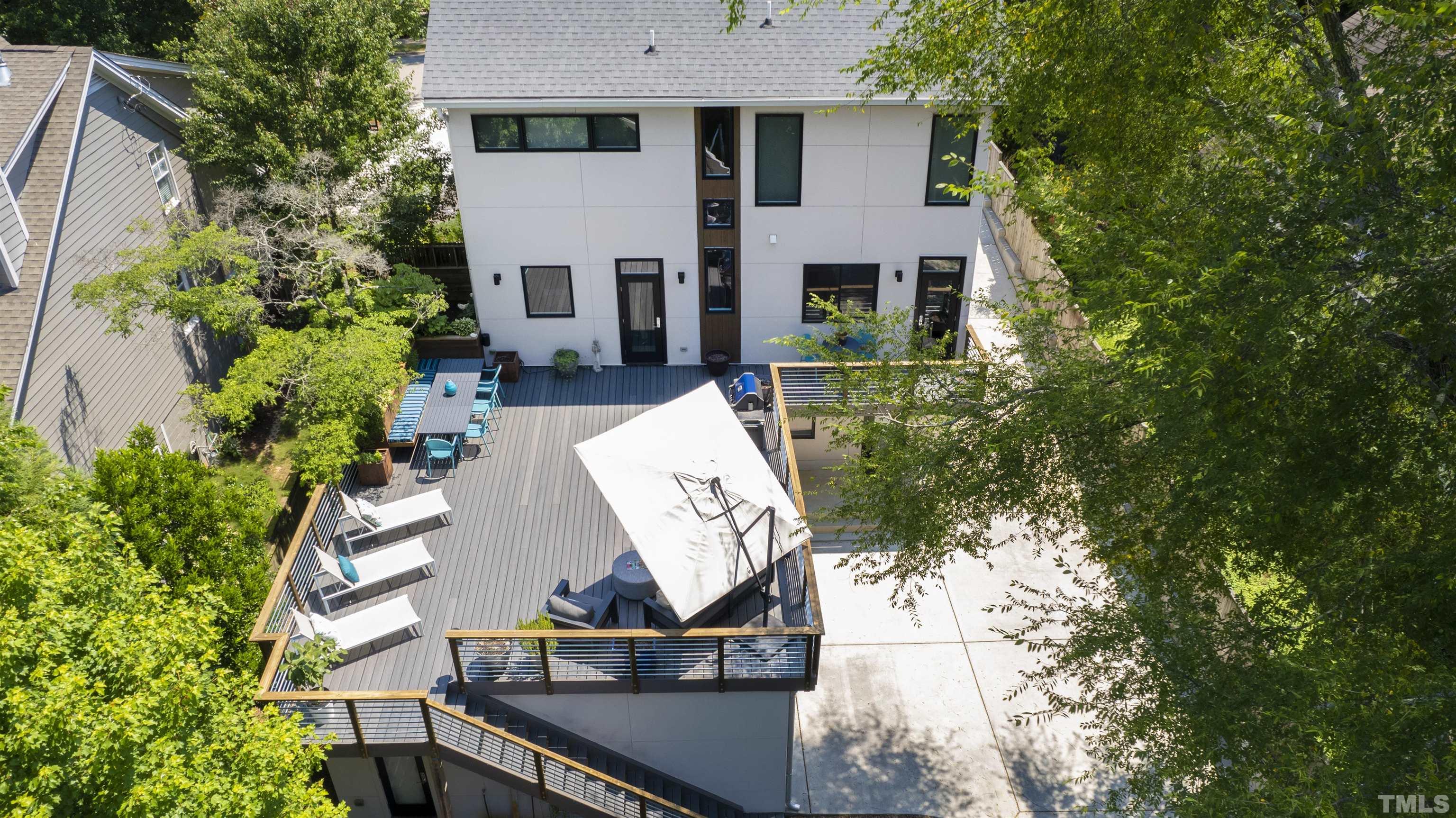 2105 Pine Drive Raleigh, NC 27608 - Photo 51 of 54 a view of a house with a yard