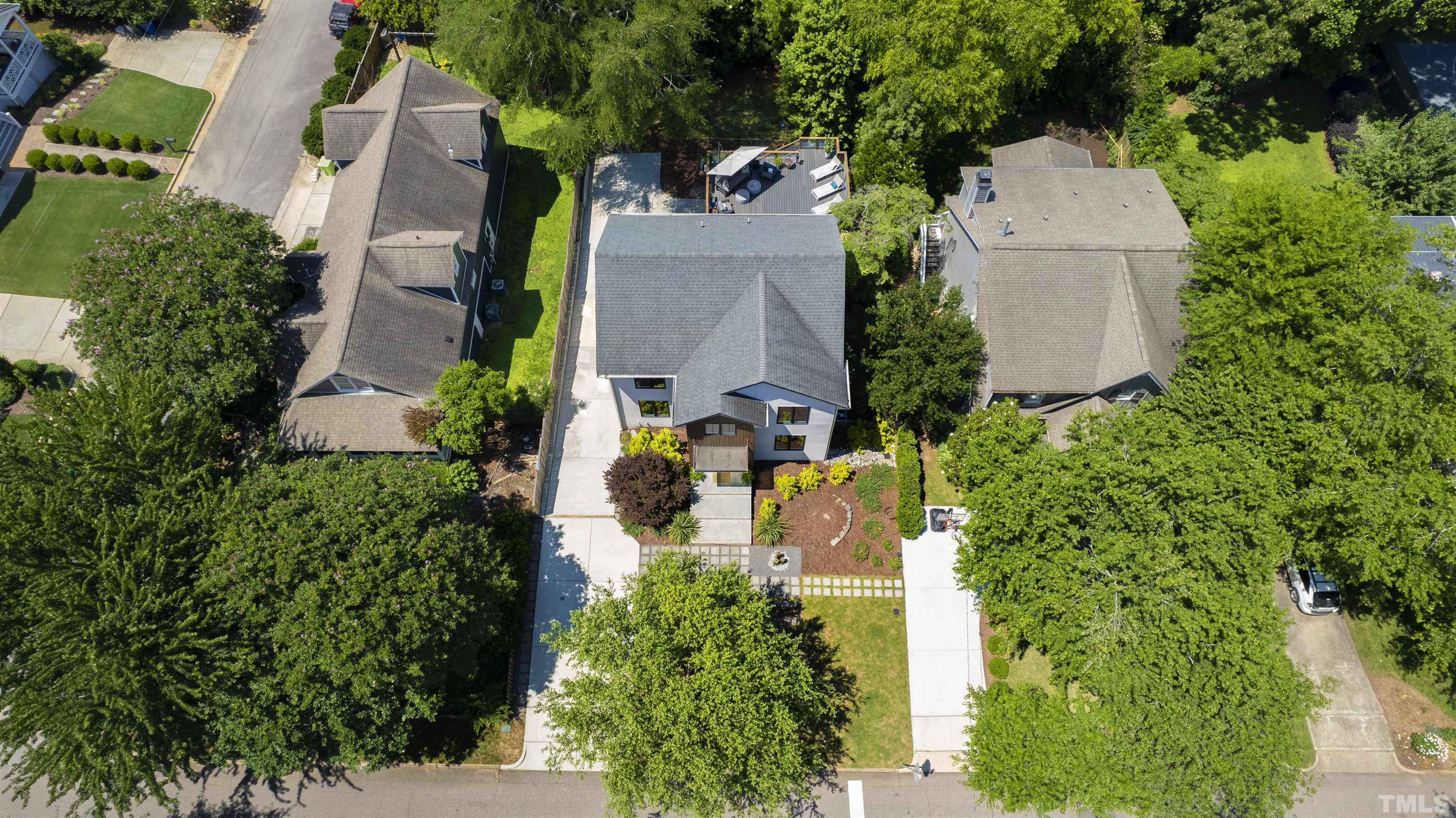 2105 Pine Drive Raleigh, NC 27608 - Photo 53 of 54 an aerial view of a house with a yard and garden