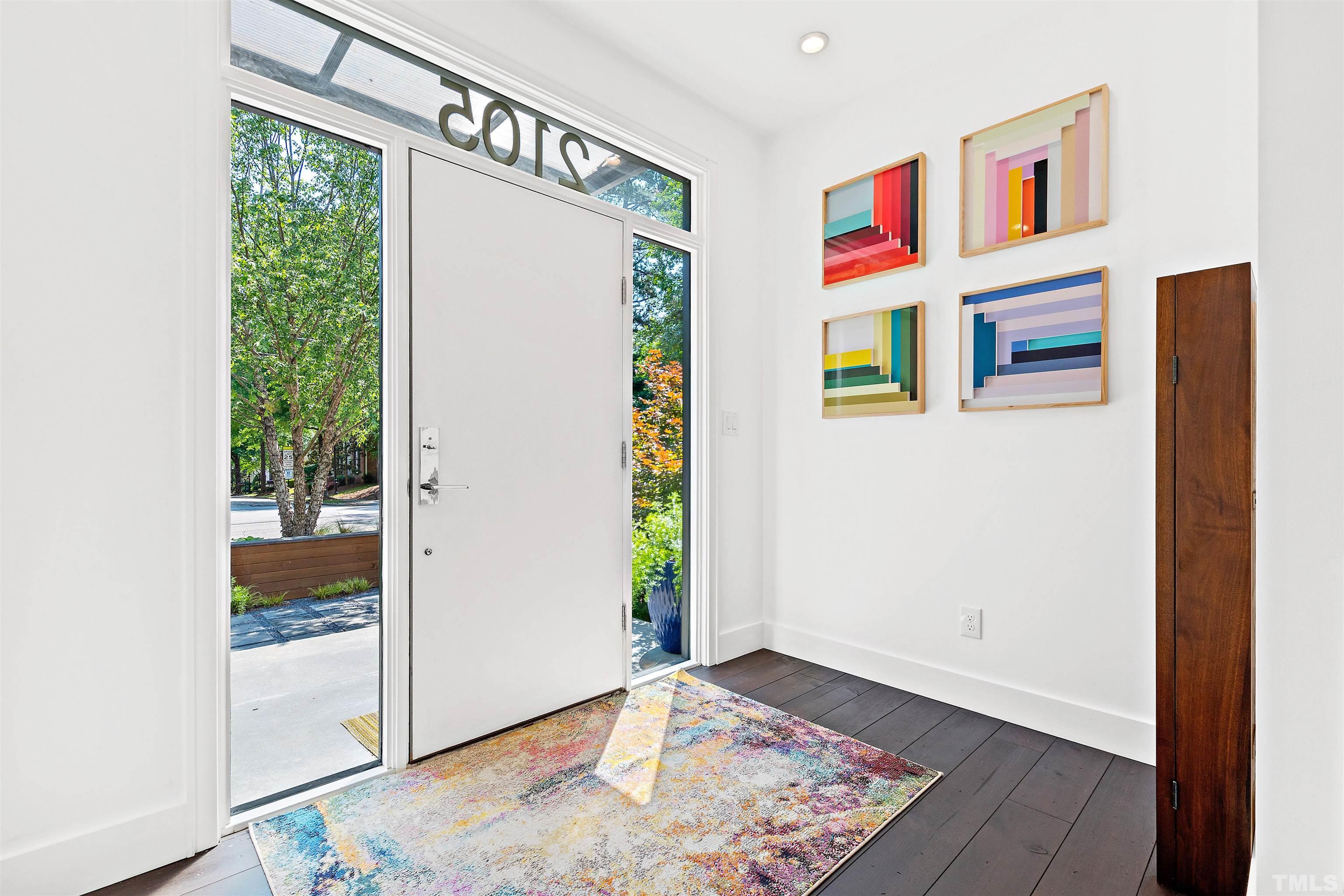 2105 Pine Drive Raleigh, NC 27608 - Photo 6 of 54 a view of an entryway with wooden floor