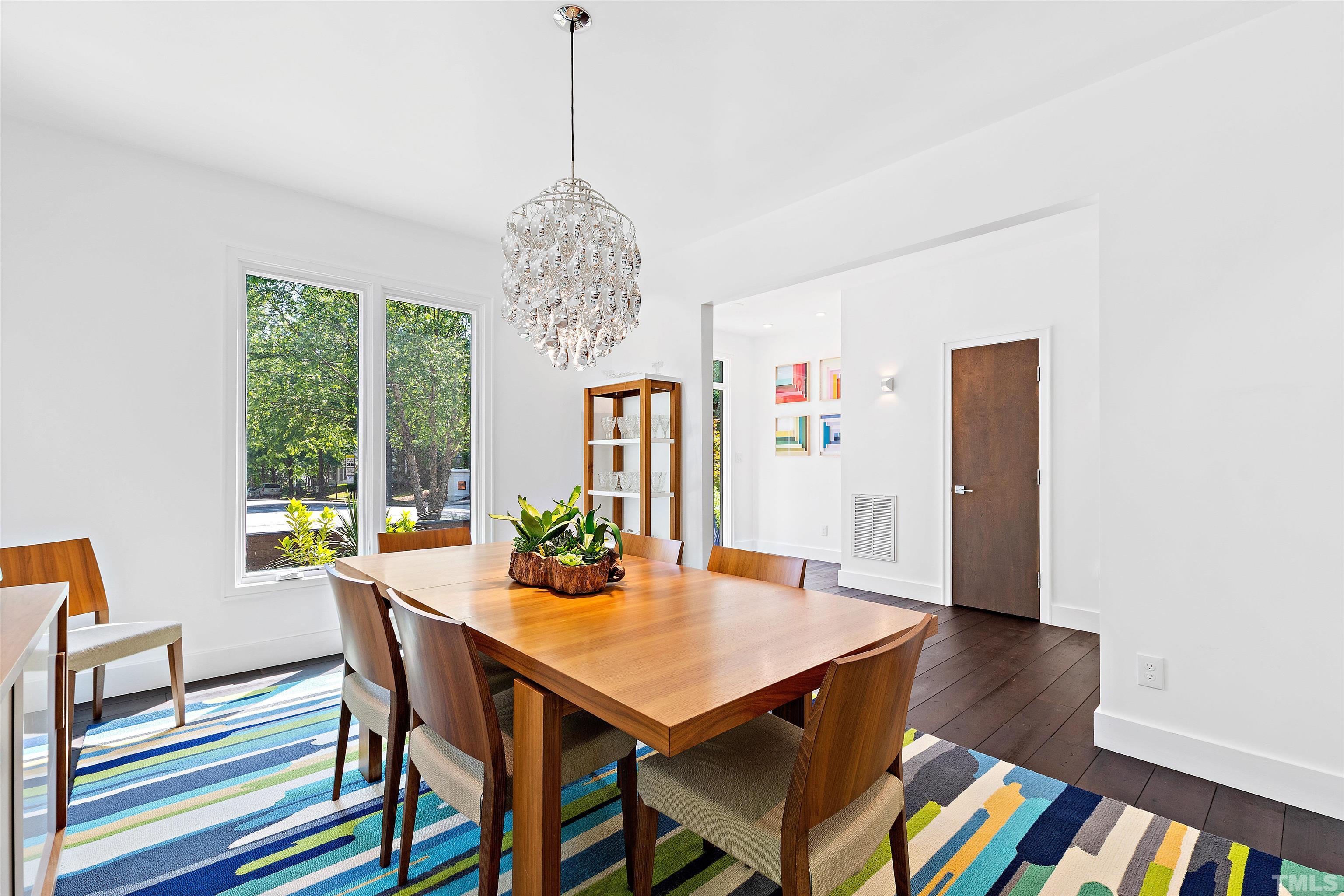 2105 Pine Drive Raleigh, NC 27608 - Photo 8 of 54 a view of a dining room with furniture window and outside view
